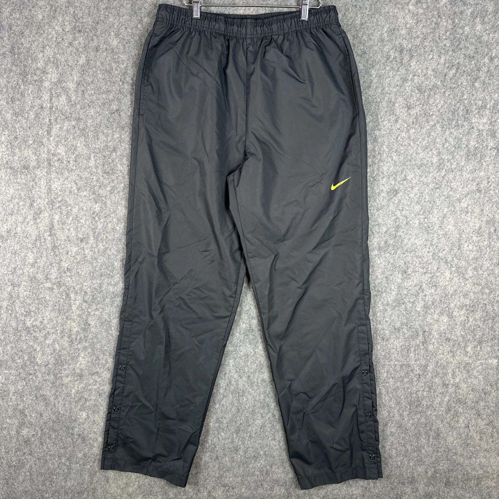 Nike Golf Pants Mens Medium Black Storm-FIT 10 Waterproof Rain Snap Cuffs Swoosh