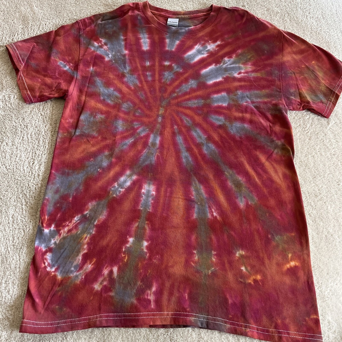 red and gray tie dye shirt