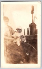 Vtg B&W Snapshot Baby On Car Fender Gingham Dress Woman Gas Pump 1920s
