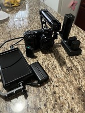 Sony Alpha ZV-E10 Mirrorless Digital Camera with 16-50mm Lens and Batteries