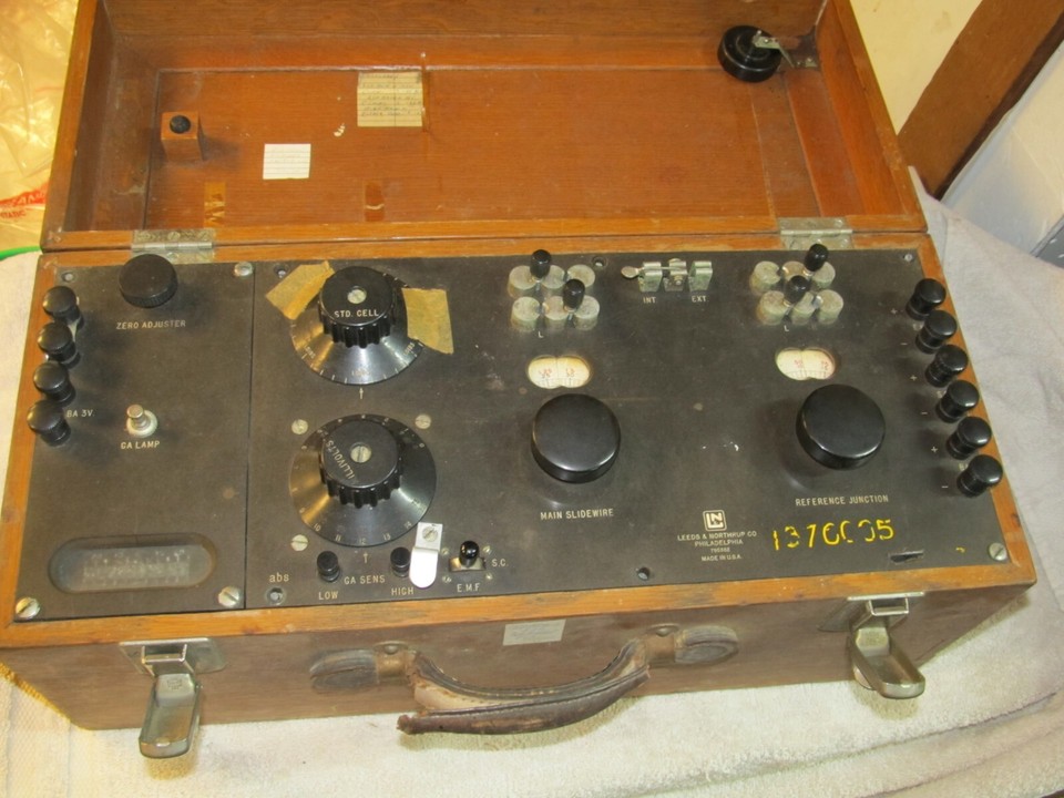 A Leeds & Northrup precision instrument in its original wood case — the kind of beautiful scientific object that doubles as furniture.