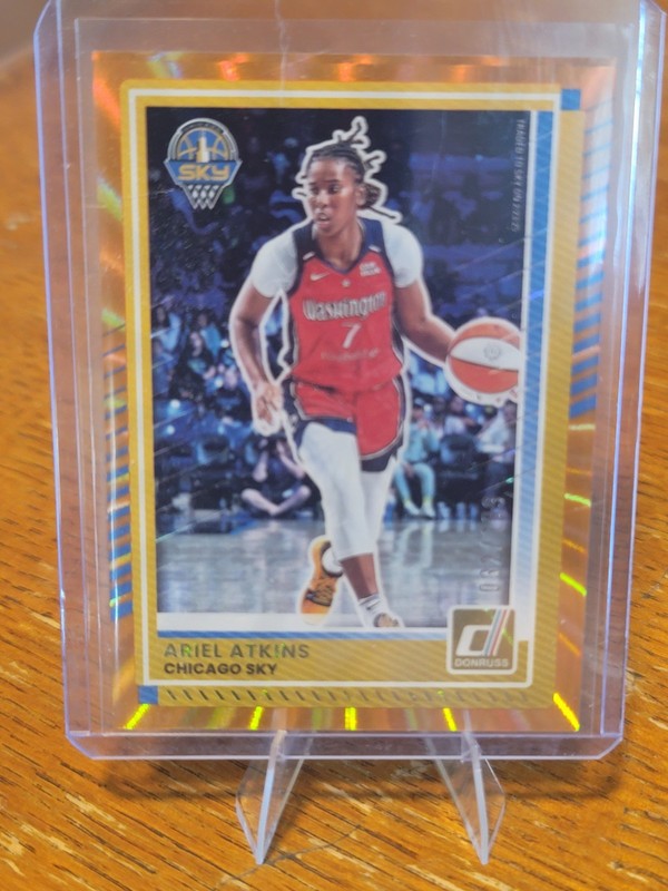 Ariel Atkins 2025 Panini Donruss WNBA Orange Laser #'d 32/199 card no. 74