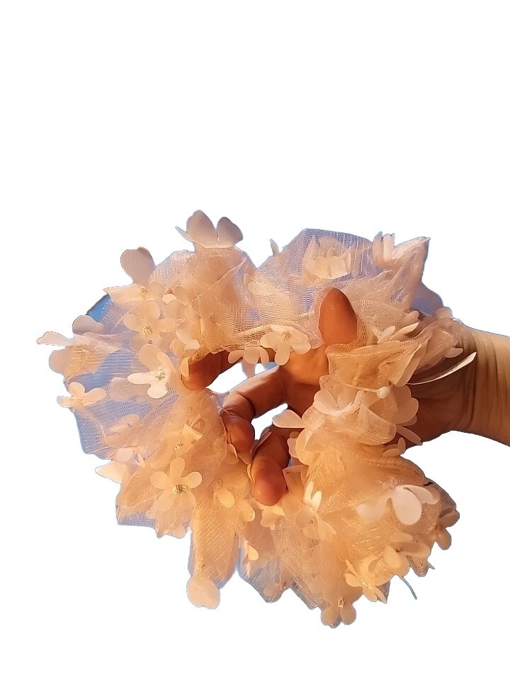 CLAIRES ROSA FLOR PELO PIECE Foto 2 de 4