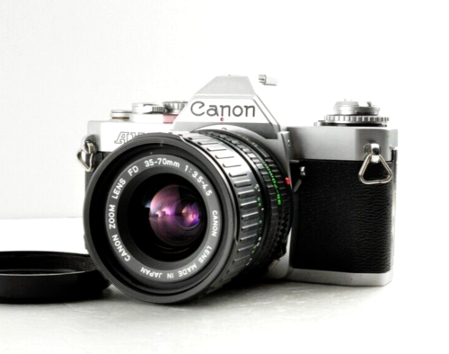 CANON AV-1 av1 Silver w/NFD F35-70mm 1:3.5-4.5 lens SLR FILM CAMERA /Near Mint - Picture 1 of 13