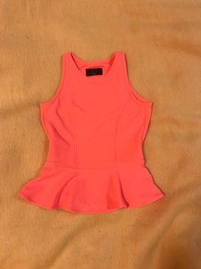 coral peplum top
