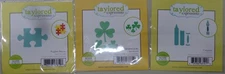 Taylored Expressions; Lot of 3 mini dies; puzzle, shamrocks, crayon; NEW