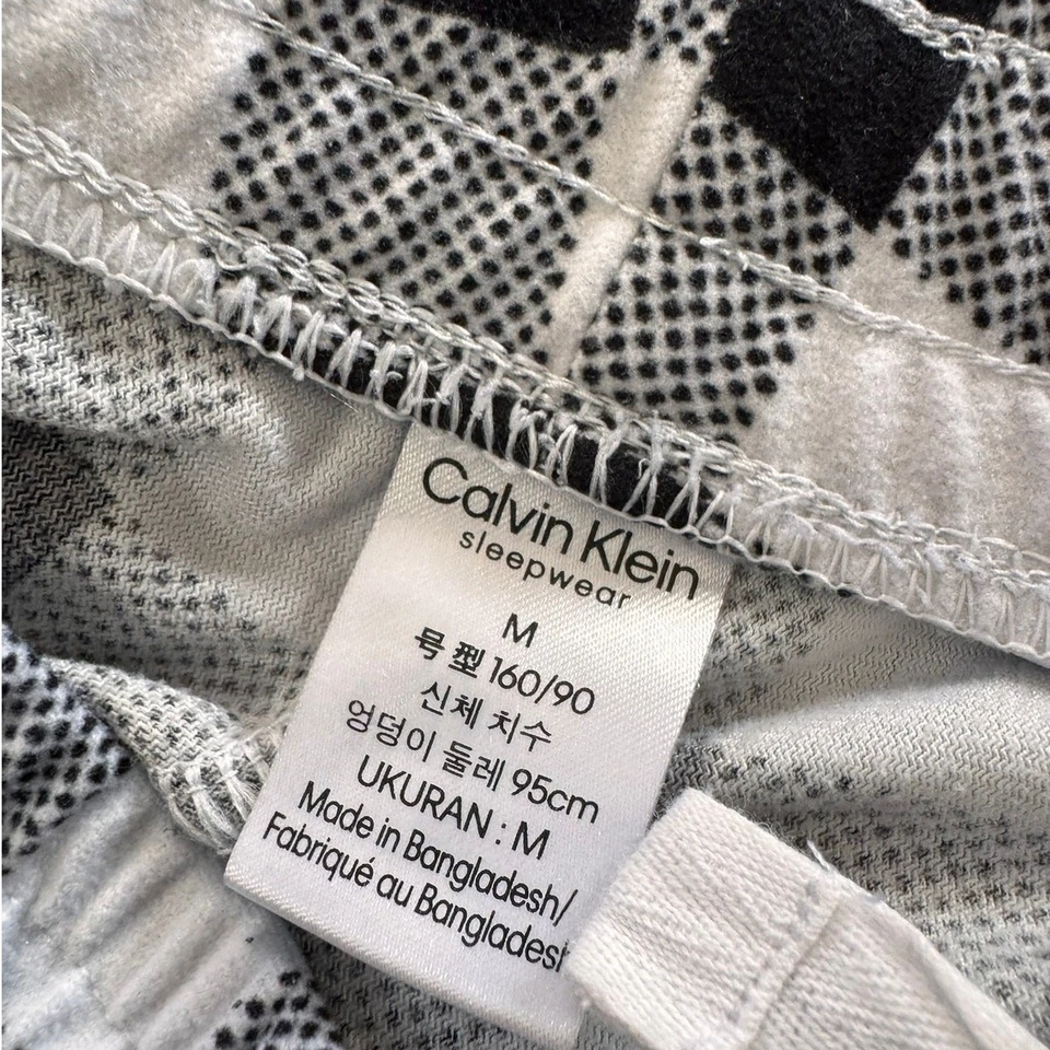 Pantalones de salón Calvin Klein para mujer talla mediana negros blancos a cuadros  Foto 3 de 4