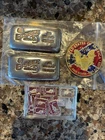 2- 100 gram .999 Bisbee silver ingots, 20- 1 gram ingots, 1-1oz. silver coin