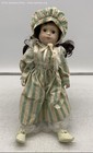 Brinn's 1990 Porcelain Striped Green Dress Doll — photo 1