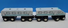 Lot of 2 Wooden Railroad Magnetic Trains.