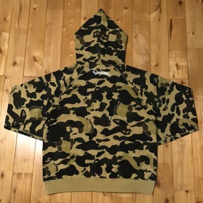 BAPE × kaws bendy 1st camo yellow full zip hoodie A Bathing Ape