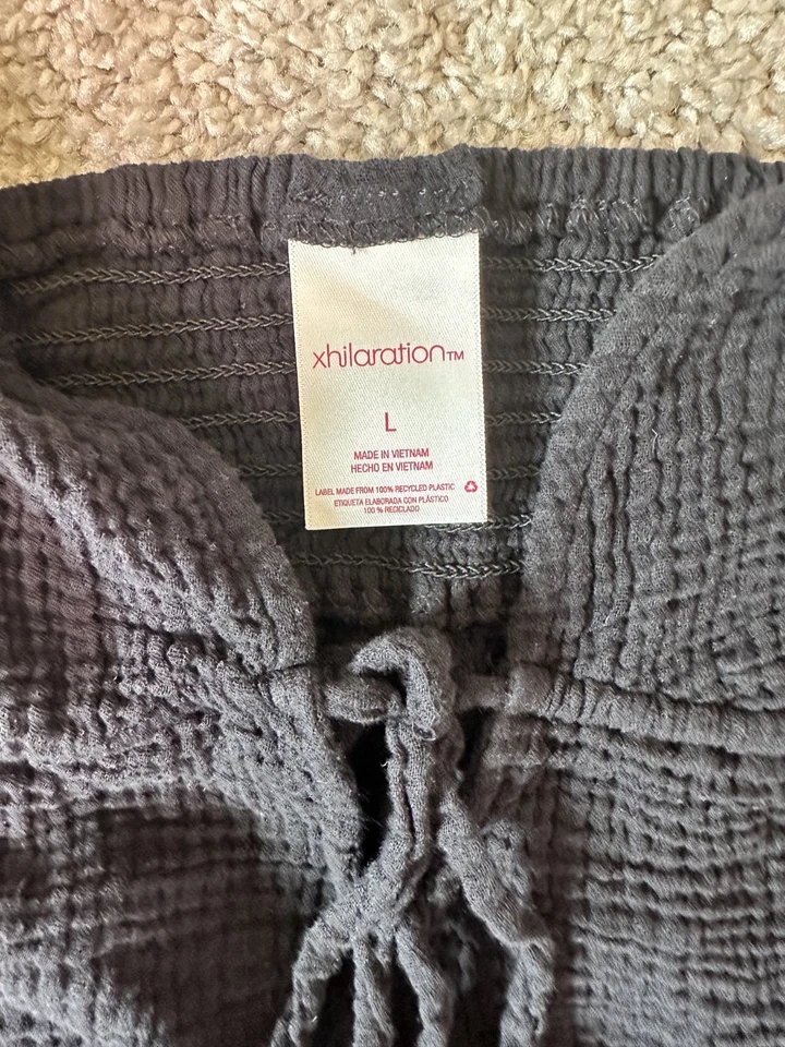 Top de natación de gasa Xhilaration negro talla L sin mangas caprichoso playa Foto 2 de 3