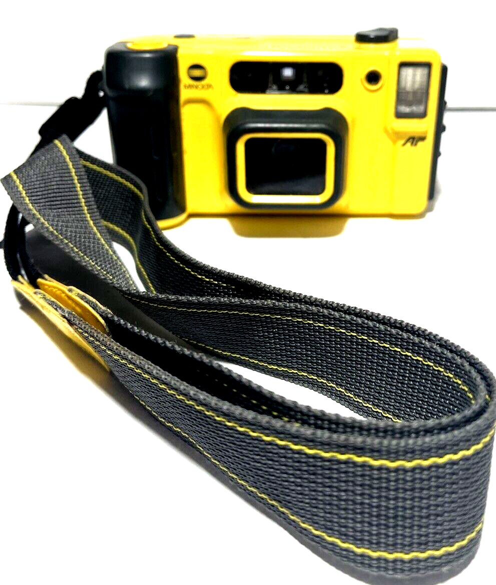 A Minolta Weathermatic Dual 35 Camera, with strap, manual, warranty
