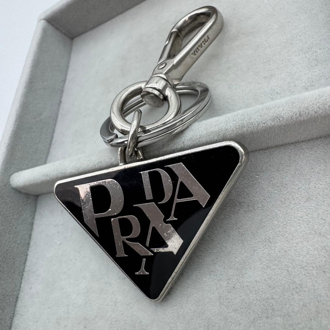 Prada Triangle Logo Keychain Black Silver Enamel Charm RFID Aura