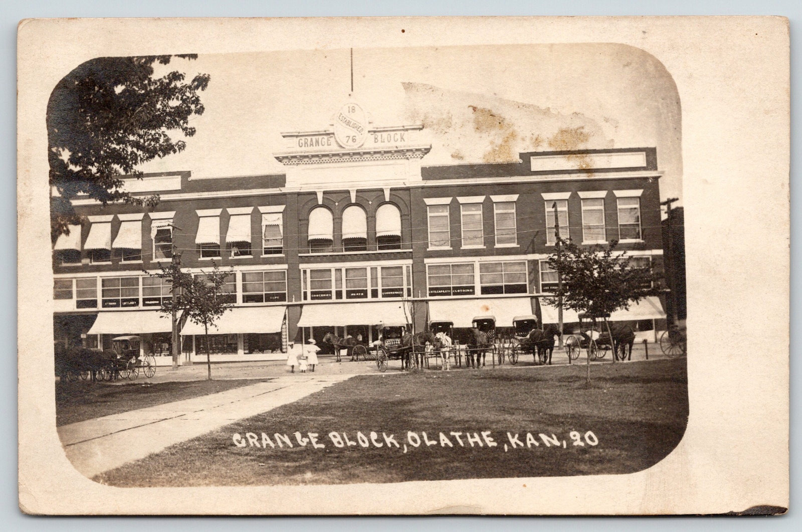 Olathe KansasGrange Block StoreMeatGroceryClothesHats CapsWagons