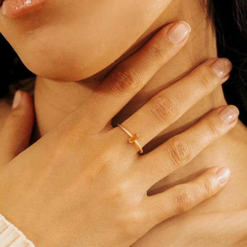 Elegant Citrine Engagement Ring Featuring Baguette Gemstone Design-image