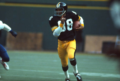 Wide Receiver Lynn Swann Pittsburgh Steelers runs away from a Buf- 1974 Photo