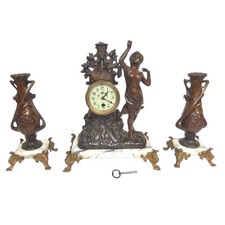 GARNITURE DE CHEMINEE PENDULE ET 2 VASES REGULE