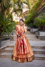 Presenting Jacquard Silk Cream Lehenga Choli With Fancy Dupatta For Festival