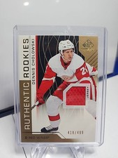 2018 SP Game Used Authentic Rookies Gold Jersey 418/499 Dennis Cholowski  RC