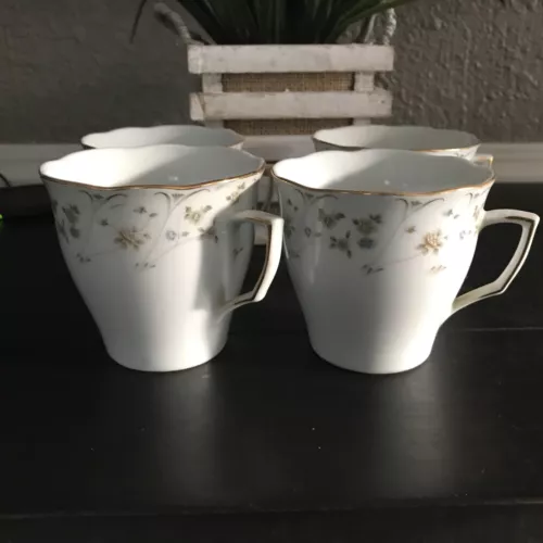 SET OF FOUR  BRIARWOOD  PATTERN ME212 BLUE/PEACH FLORAL MUGS