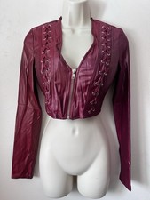 Burgundy faux leather corset top with lace-up front and zipper closure