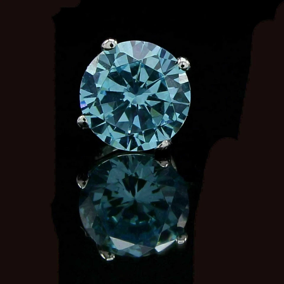 Aretes individuales de diamantes azules creados en laboratorio de 1 quilate enchapados en oro blanco de 14 K Foto 2 de 3
