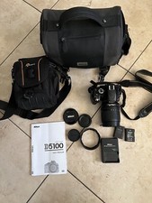 Nikon D5100 16.2MP Digital SLR Camera Bundle AF-S DX VR 18-105mm lens and extras