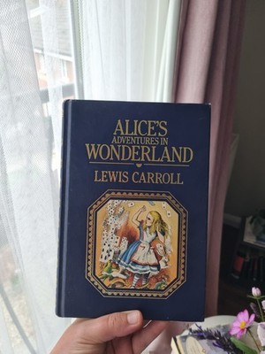 Alice's adventures in Wonderland ; and, Through the looking... by Carroll, Lewis