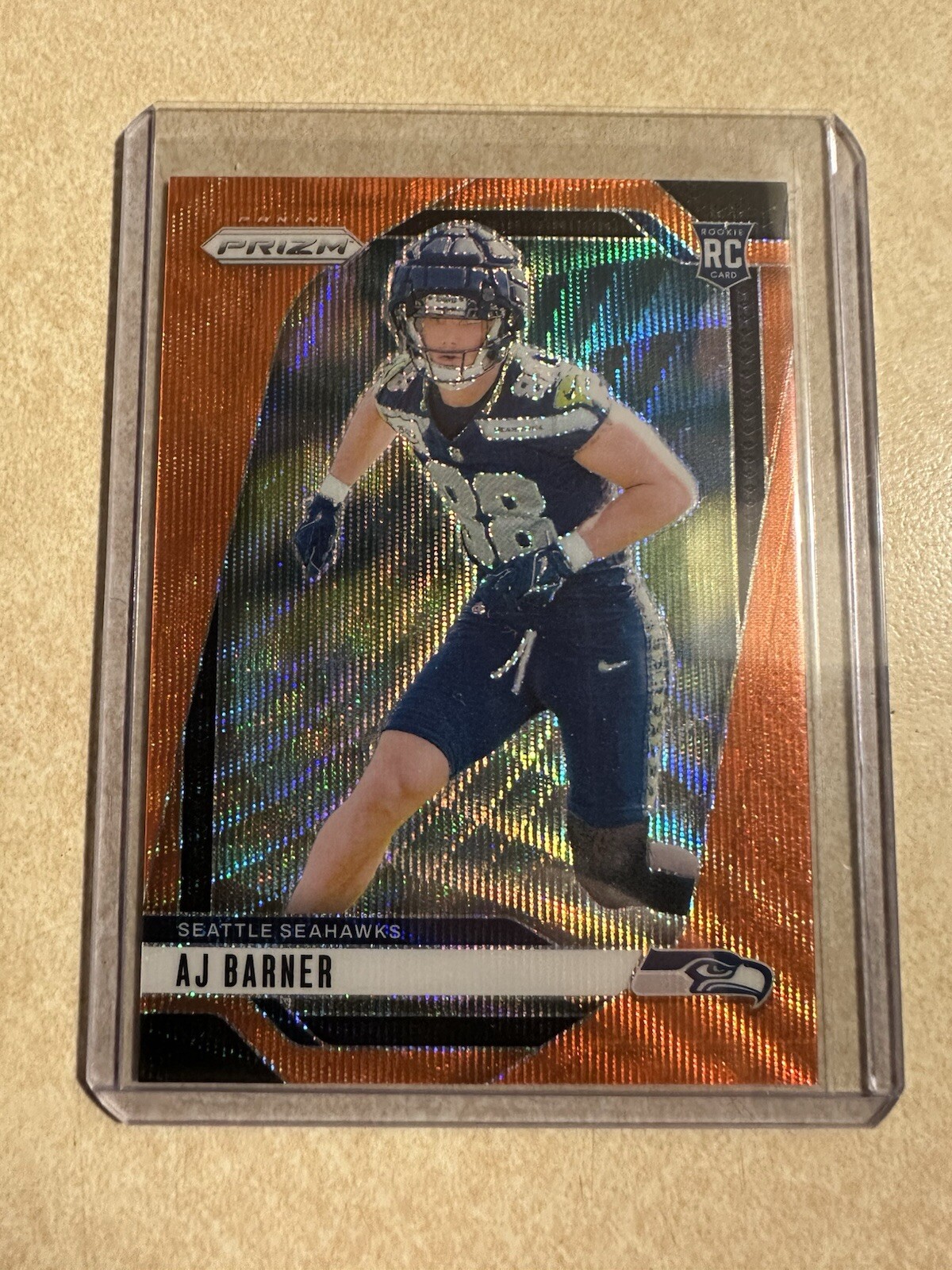 2024  Prizm AJ Barner #304 RC Orange Wave Prizm  #’d 58/60 Seahawks Rookie