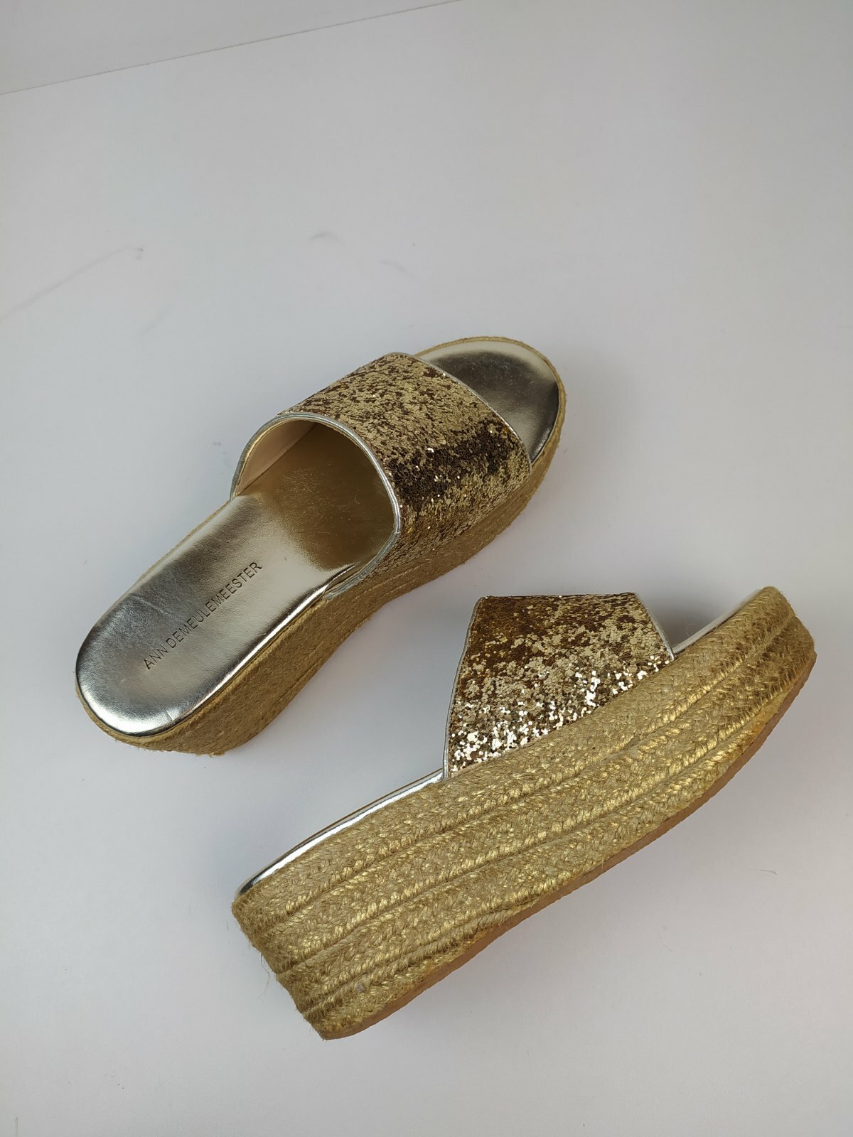shiny gold flip flops
