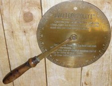 Rueda publicitaria de latón vintage rueda viajera medida por T.Connolly