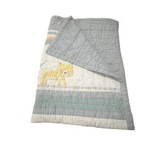Manta acolchada para cuna Pottery Barn Kids de algodón orgánico Little Lion azul