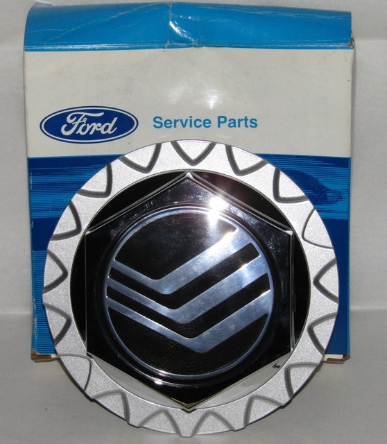 NEW FORD MOTOR COMPANY SERVICE PARTS WHEEL COVER OEM PART NO. F2MY1130