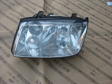 VW BORA Scheinwerfer Links Vorne Hella 963597-00L2     Regal : 5161