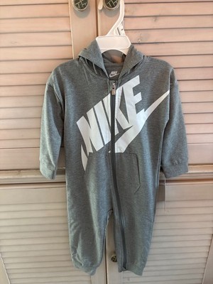 gray Nike hooded coverall features a full-zip front and a large white Futura log