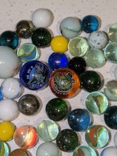 Bag of marbles w/ 2 marvel marbles