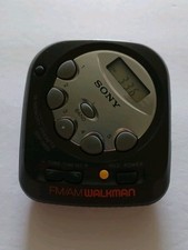VINTAGE SONY WALKMAN SRF-M35 PORTABLE POCKET AM FM RADIO W/BELT CLIP TESTED