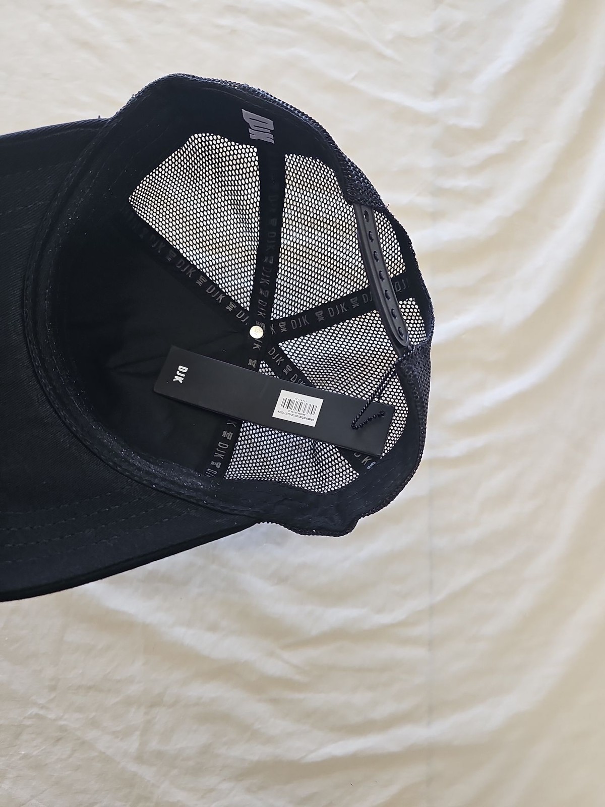 DJK International Black Mesh Trucker Cap image 2