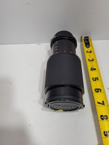 Vivitar 62mm lens. comes with case (not pictured)