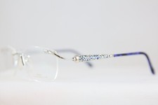 NOS NEW VINTAGE NEOSTYLE MOZART 1323 RIMLESS EYEGLASSES