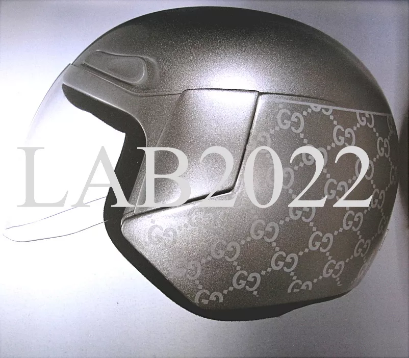 GUCCI TOM FORD SILVER BOOK MOTORCYCLE HELMET THAT GWYNETH TOOLS AROUND  LONDON