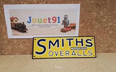 VINTAGE PLAQUE DE COMMERCE SALOPETTE SMITH OVERALLS. EN METAL. 8,5CM X 6,5CM - Photo 1/3