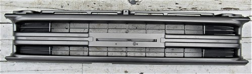 Toyota YN85 2WD Mod 1989 97 P/U UTE front radiator grille mask new Genuine - Picture 2 of 9