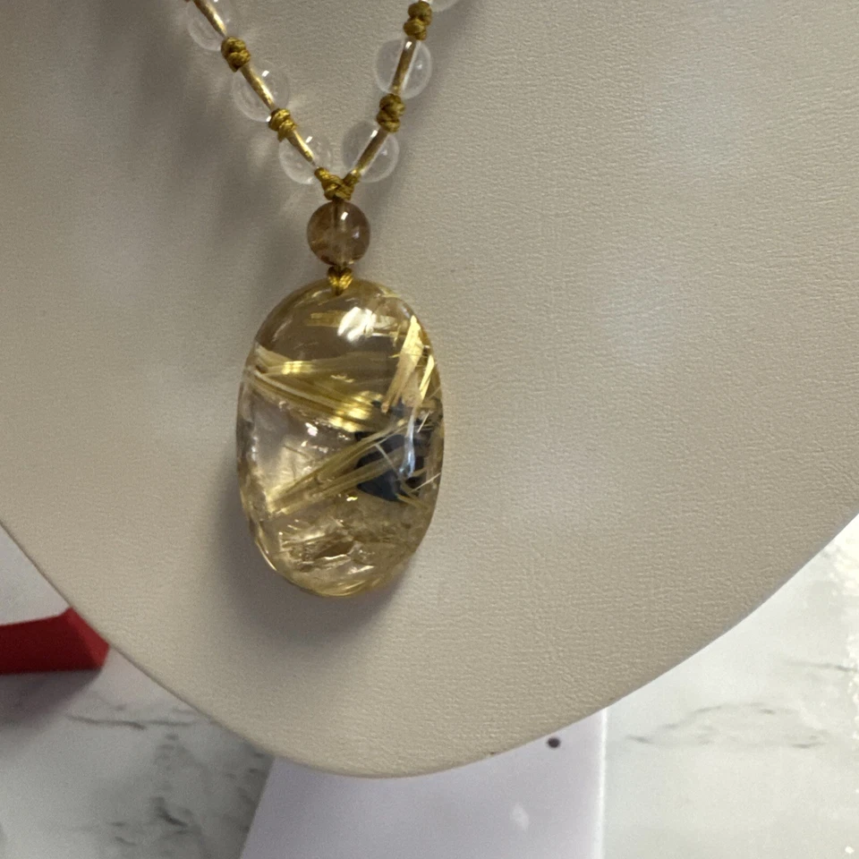 Colgante de cristal de titanio natural Foto 2 de 4