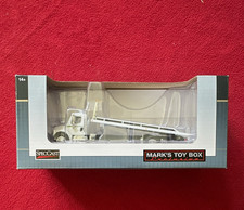 Speccast 164 International 8600 Rollback Flatbed Truck White
