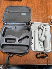DJI OM 5 3-Axis Smartphone Gimbal Stabilizer. Includes Hard Case And Pouch