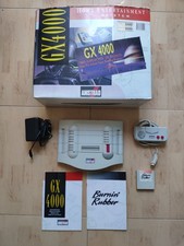 Amstrad GX 4000 Video Game Console Burnin' Rubber and original box and instructi