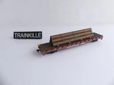 EVEMODEL HO WAGON PLAT A BOGIES TYPE US + CHARGEMENT DE 6 TUYAUX - Photo 1/2