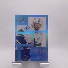 2024-25 Upper Deck Series 1 UD Portraits  J.T. Miller Vancouver Canucks #P-11